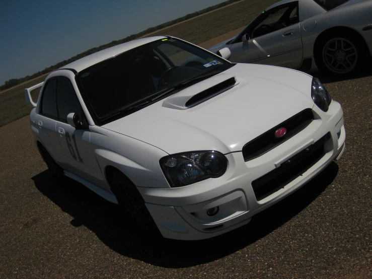 this is a picture of an automobile parked in a parking lot