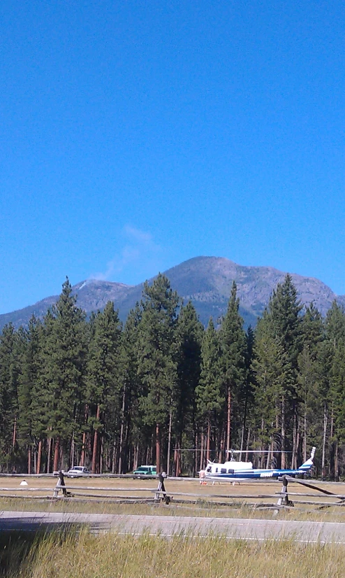 a very nice looking area with some planes and a mountain in the distance