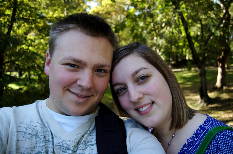 a man and woman posing for a picture