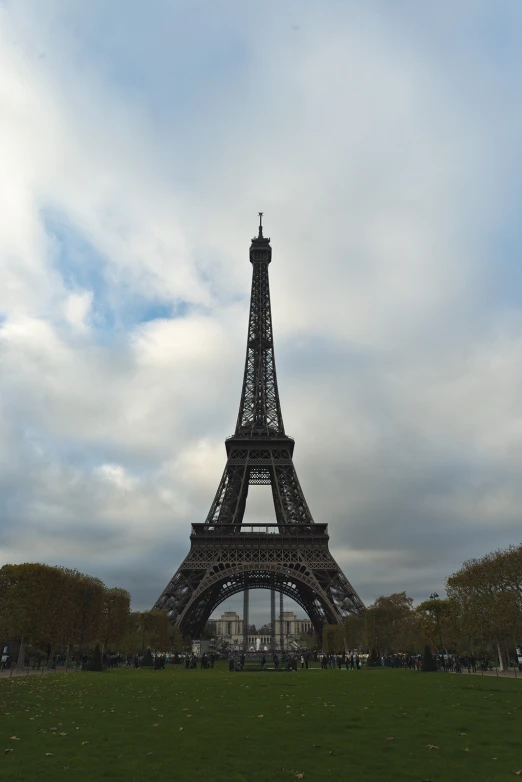 a view of a large metal tower on a cloudy day