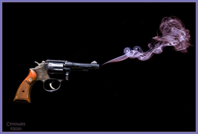 a smoke machine with a small smoking gun