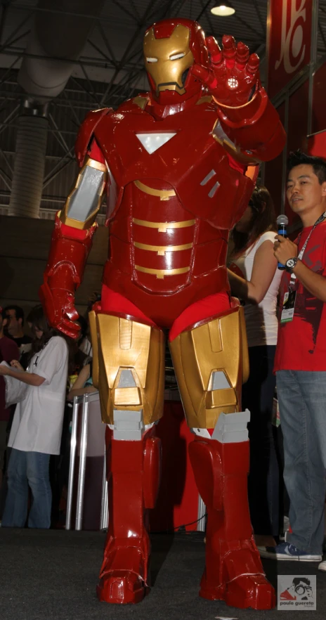 a costume is standing up against a crowd