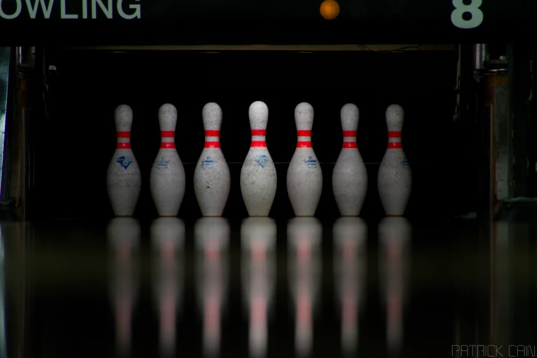 a bowling ball is coming down a lane