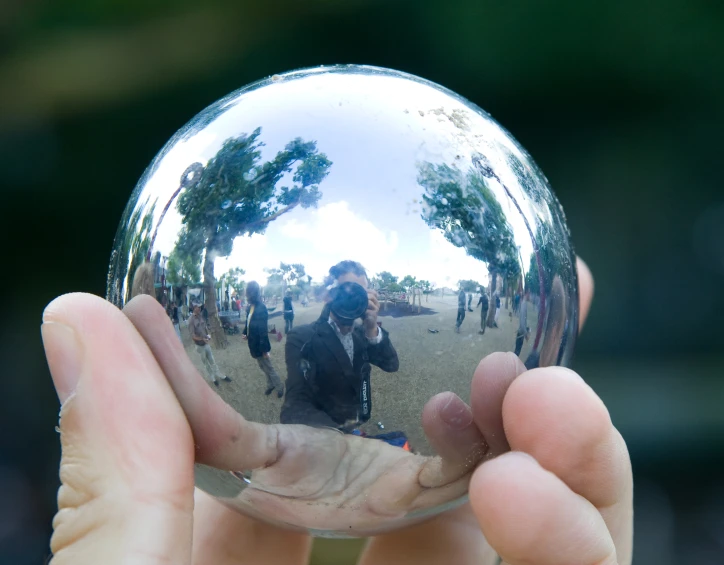 a person holding a ball in their hands