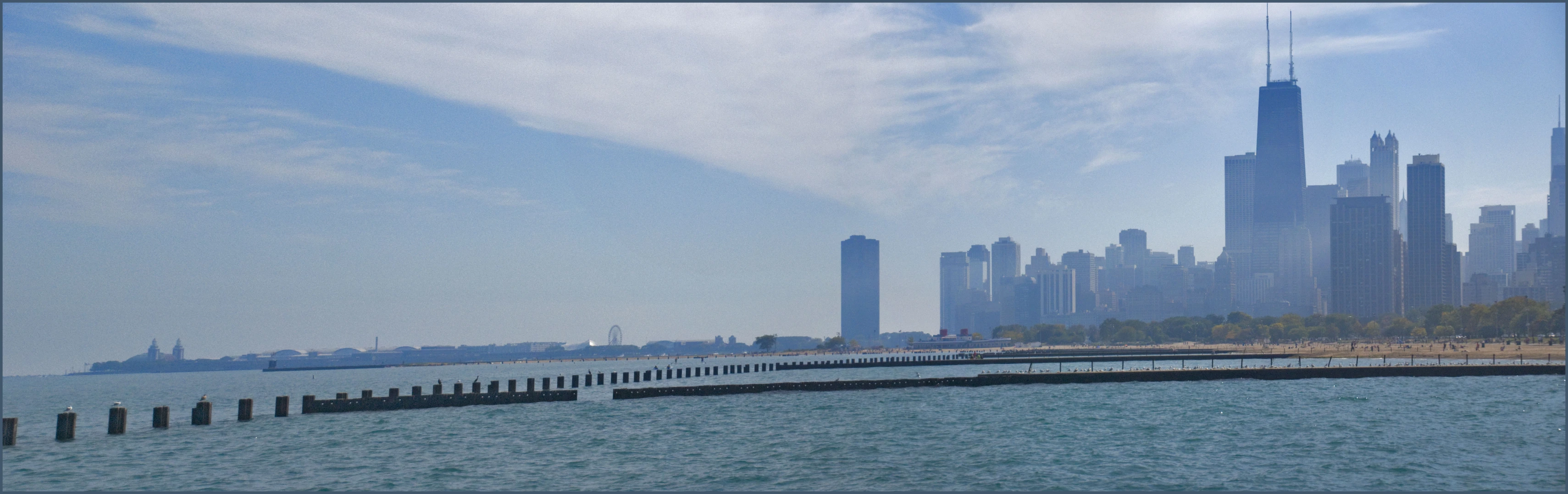 a large body of water in front of a city