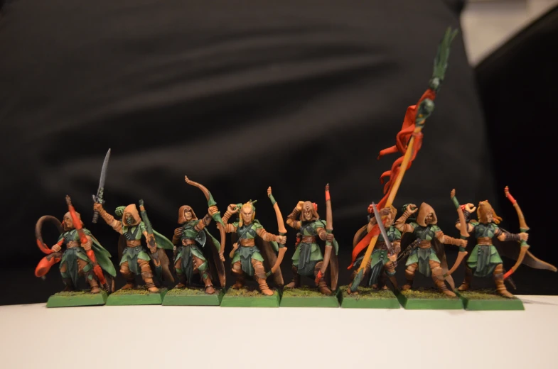 the miniature soldiers are all lined up and holding their weapons