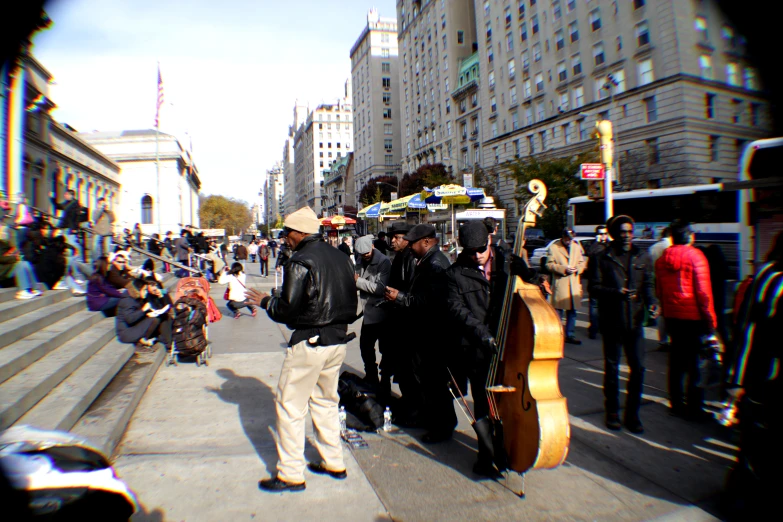 a musician playing the guitar for the crowd