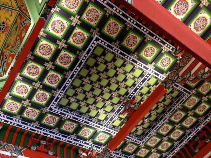 the ceiling is painted with colorful, intricate designs