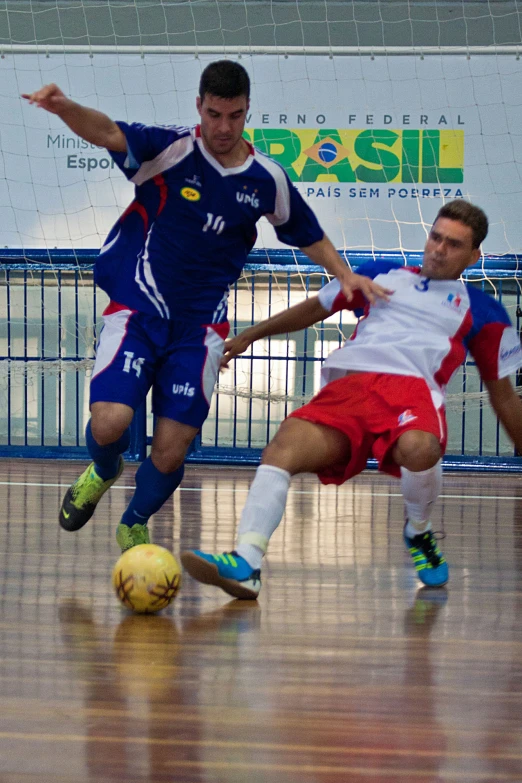 a group of men on opposite teams playing soccer