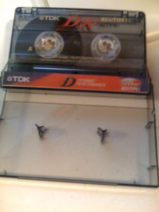a pair of cassettes stacked on top of each other