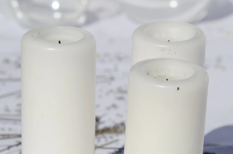 three candles have melted apart to form one candle