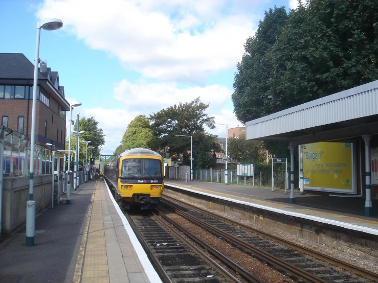 a train on the train tracks near a platform