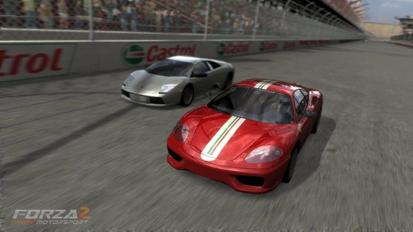 an image of two racing cars going around a track