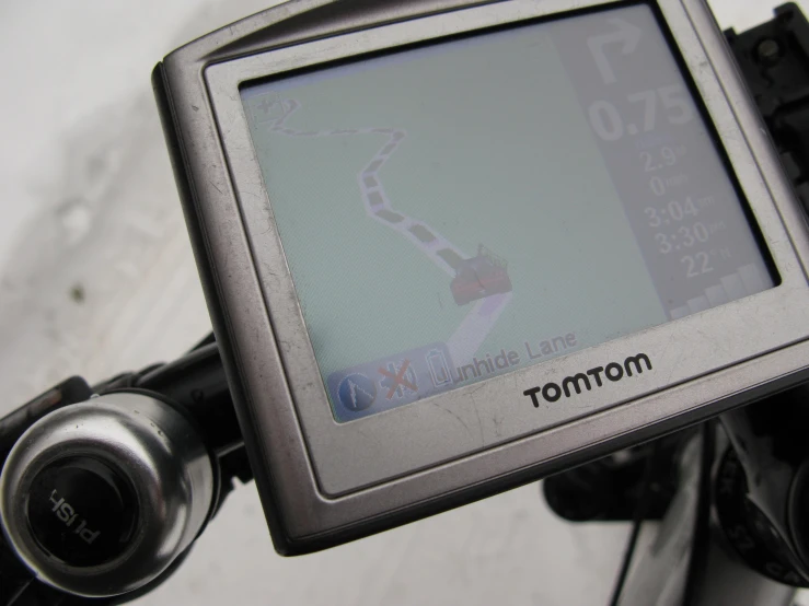 there is an electronic screen on the handlebars of a bicycle