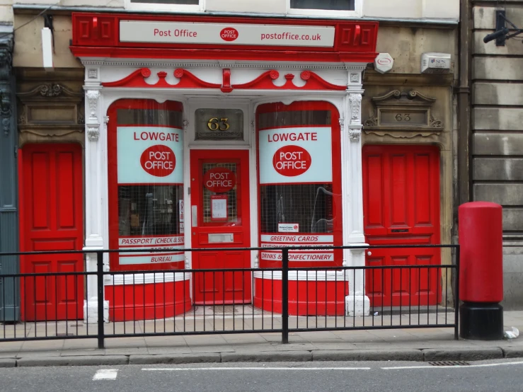 this is an image of an old building with bright red and white paint