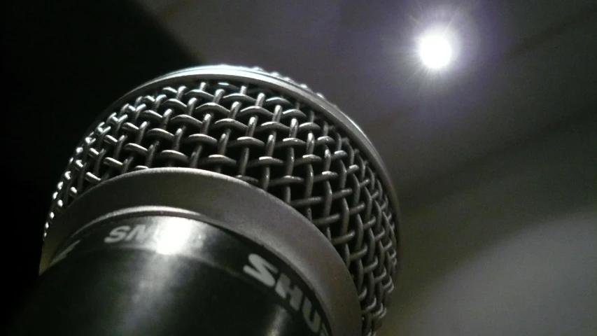 a close up of a microphone that is lit