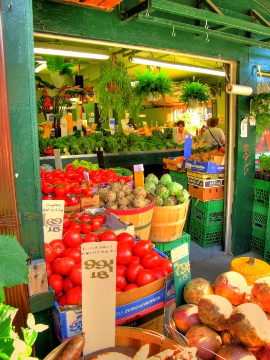 several baskets in front of produce at a market