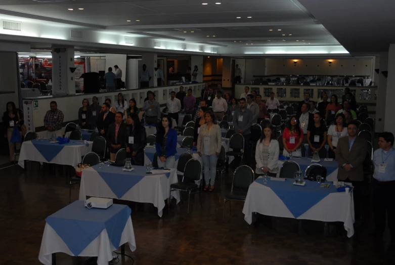 a crowd of people gathered at a banquet