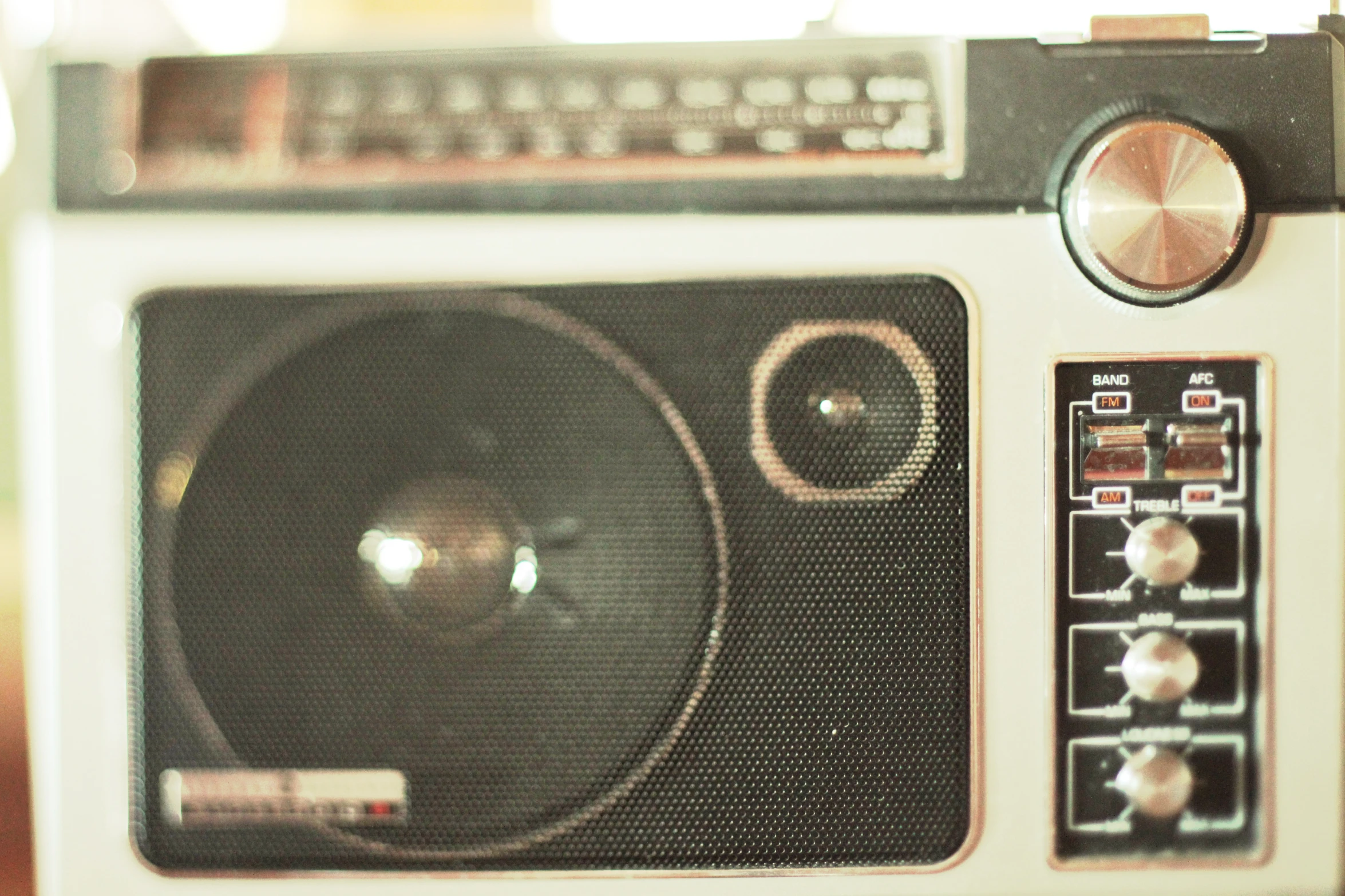 the speaker is mounted to the top of the cabinet