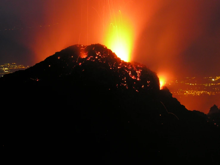 the smoke is coming out of the top of this structure