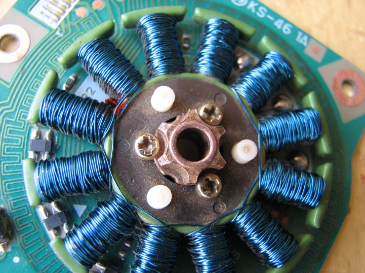 an electronic device has several pieces of wire wrapped around the board