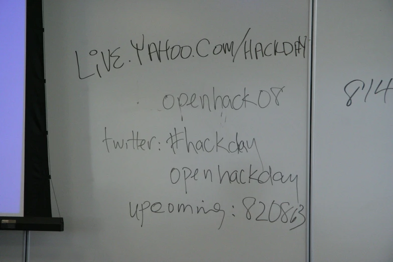 two whiteboards are covered in writing with different type of text