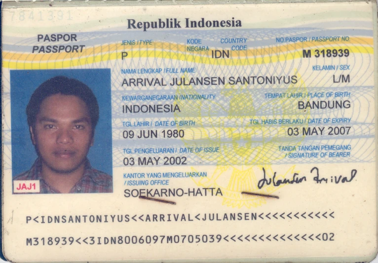 a close up of a person's driver's id badge