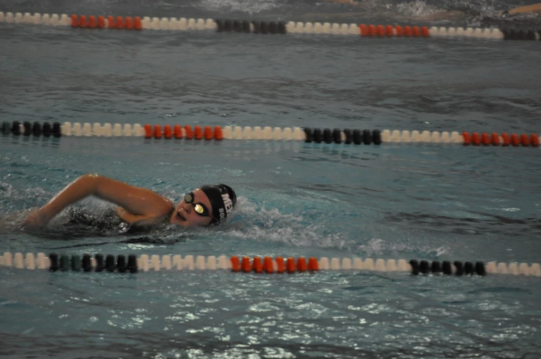 a woman swimming in the water with no one around her