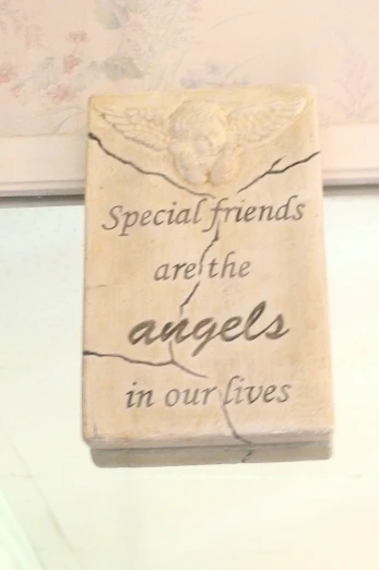 a stone sign that reads special friends are the angels in our lives