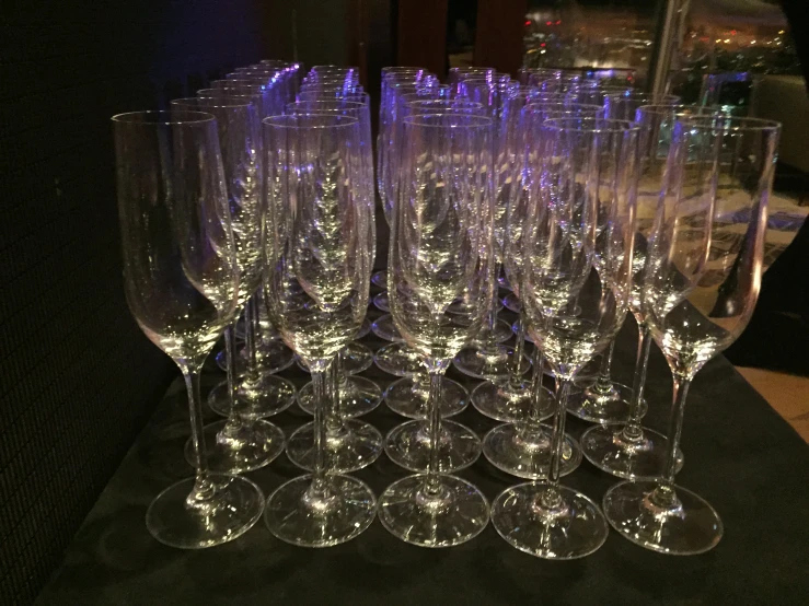 several glasses sitting next to each other on a counter