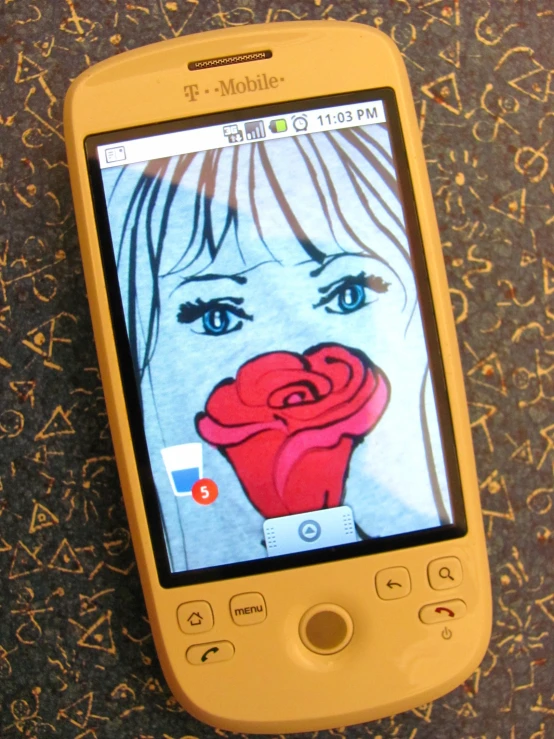 a yellow cell phone displaying an image of a woman