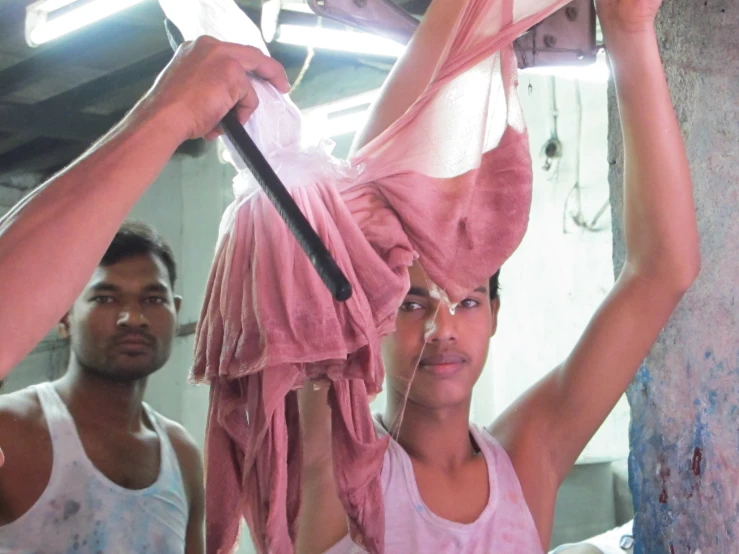 two women are drying a young lady in her room