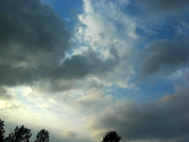 blue sky and clouds, seen from the ground