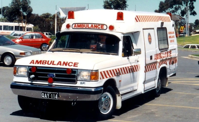 an ambulance parked in an outdoor parking lot