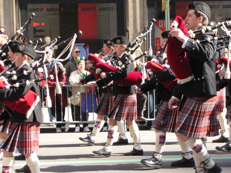 people in costume marching in the street