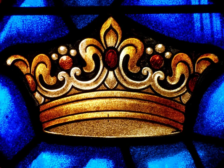 the crown is displayed in the stain glass