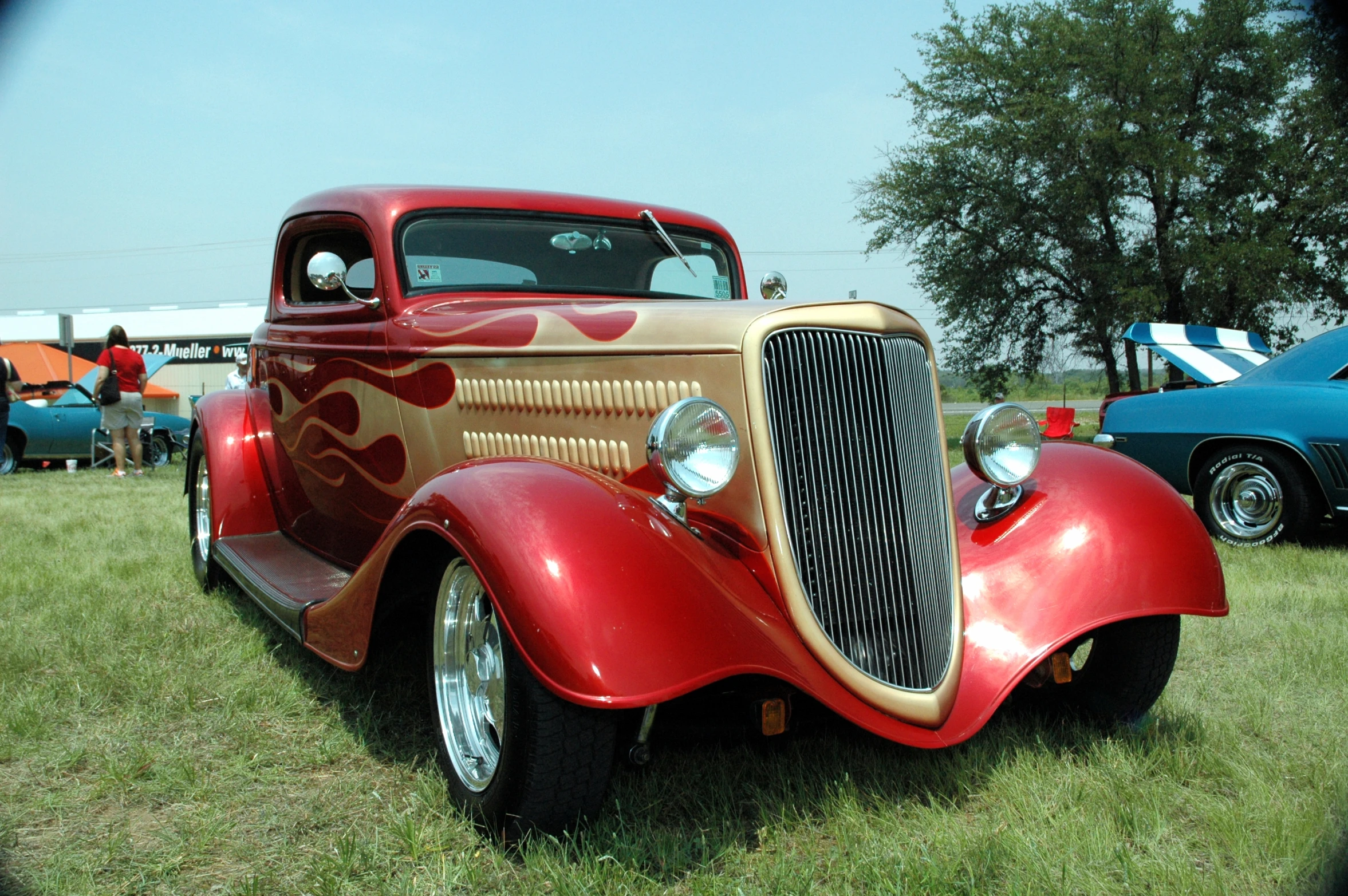 an old model fire engine on display at a car show