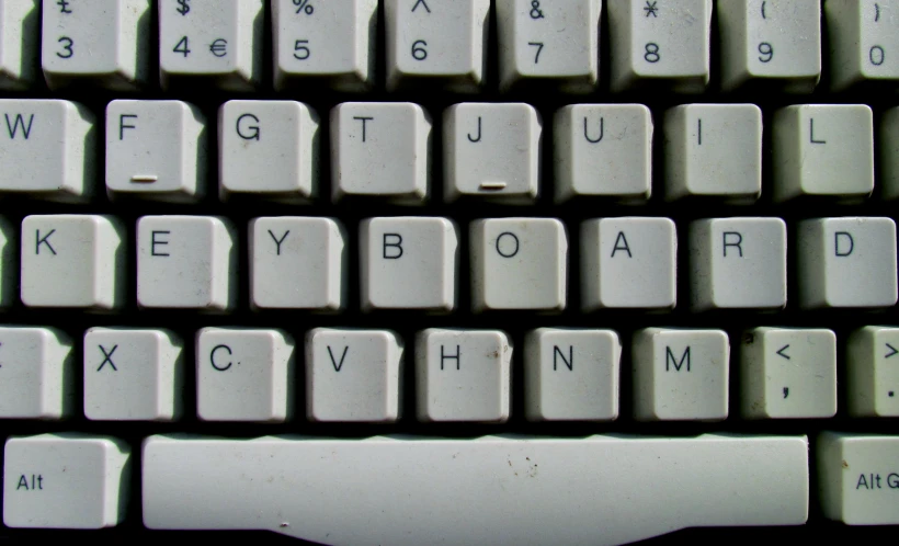 a closeup of a computer keyboard with multiple keys