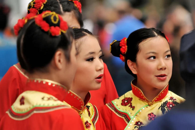 an asian couple of s in traditional dress