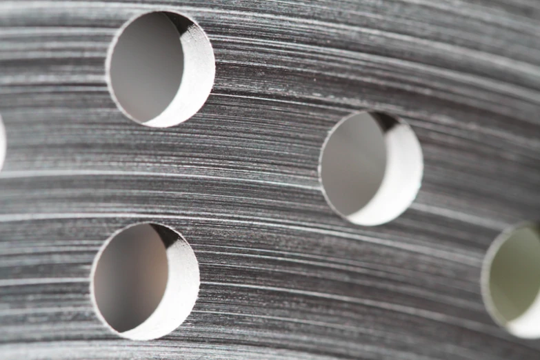 several round stainless sheets in a row and one round