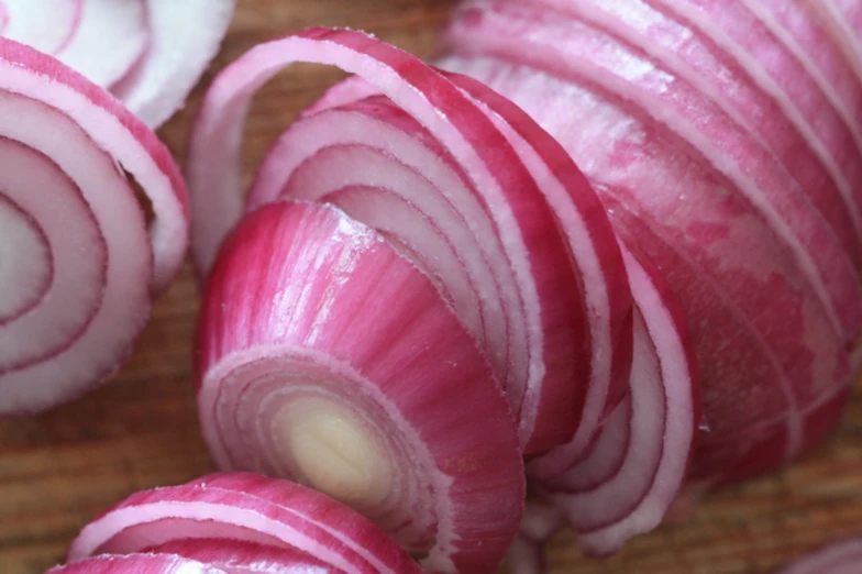 the sliced onions are being cooked and prepared to be steamed