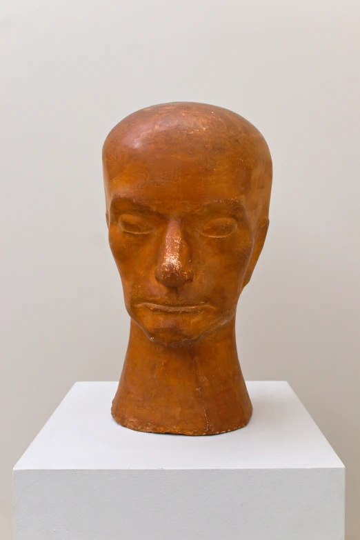 a sculpture in the shape of a man's head