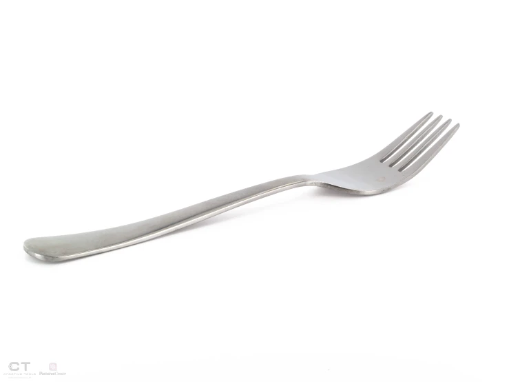 a fork sitting on top of a white counter