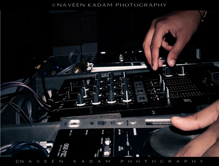 a dj mixing at a music mixing studio