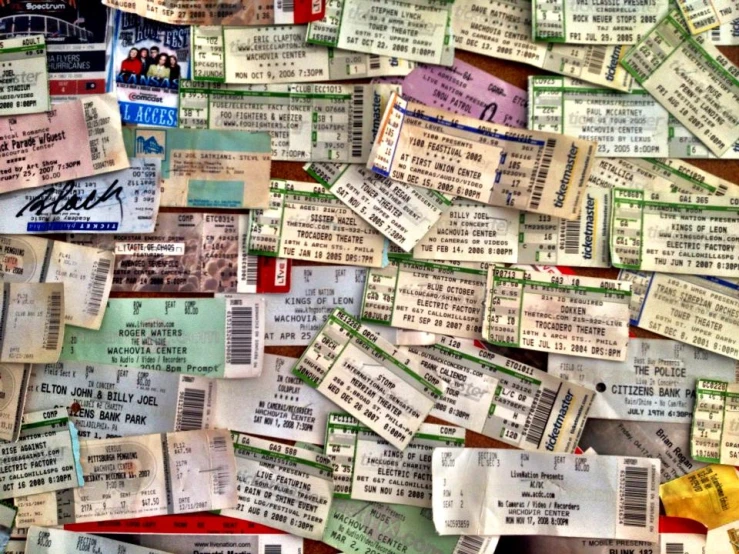 a lot of old tickets with the numbers for various dates