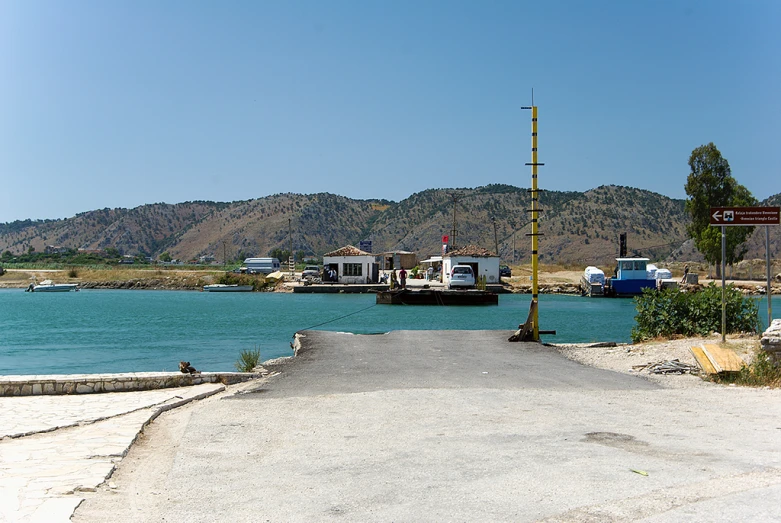 a small harbor that has a ferry going into it