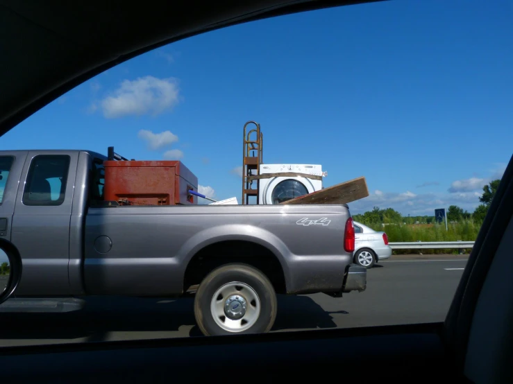 an image of a truck that is parked in the road