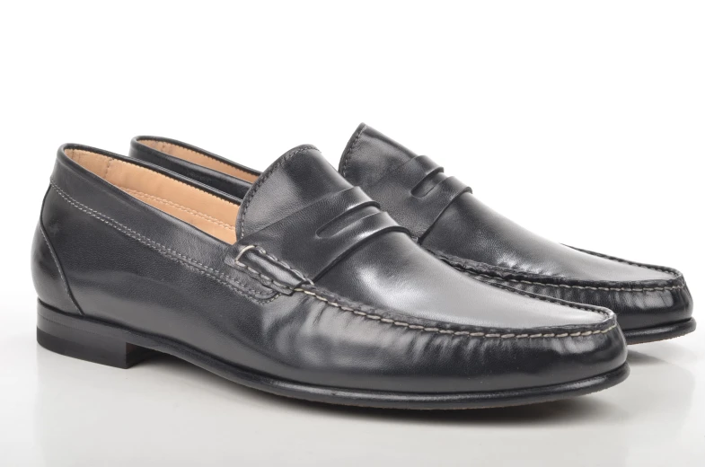 a pair of black loafers