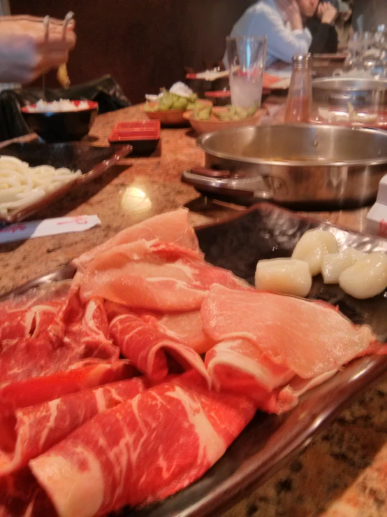 food is served on a table at a restaurant