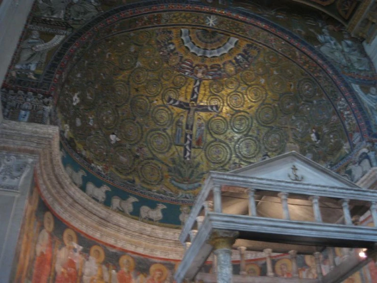 a decorative building has paintings on the ceiling